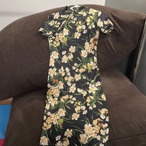 Form fitting floral butterfly midi dress